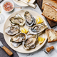a spread of oysters bread champagne